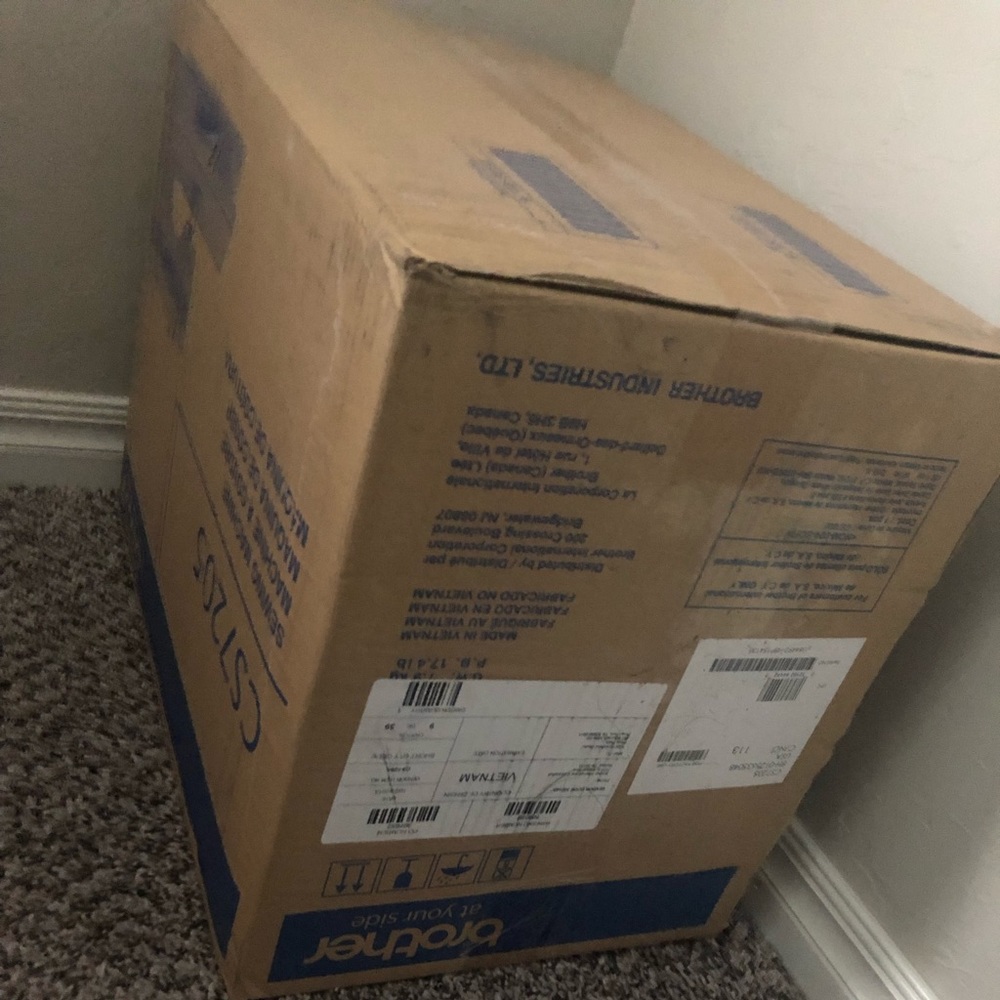 New unboxed sewing machine